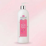 Un gel douche rose de damas d'1L de la marque Emma Noël.