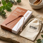 Gratte langue ayurvédique en cuivre Arista Ayurveda avec sachet crème dans packaging premium