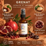 Huile de cristal grenat Ansil 50ml avec ingrédients naturels bio sur fond terracotta