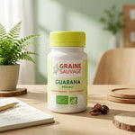 Guarana bio 60 gélules Graine Sauvage sur bureau avec plantes et accessoires bien-être