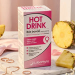 Hot Drink Femme Bois Bandé 250ml Labophyto présenté sur marbre avec ananas et éléments botaniques