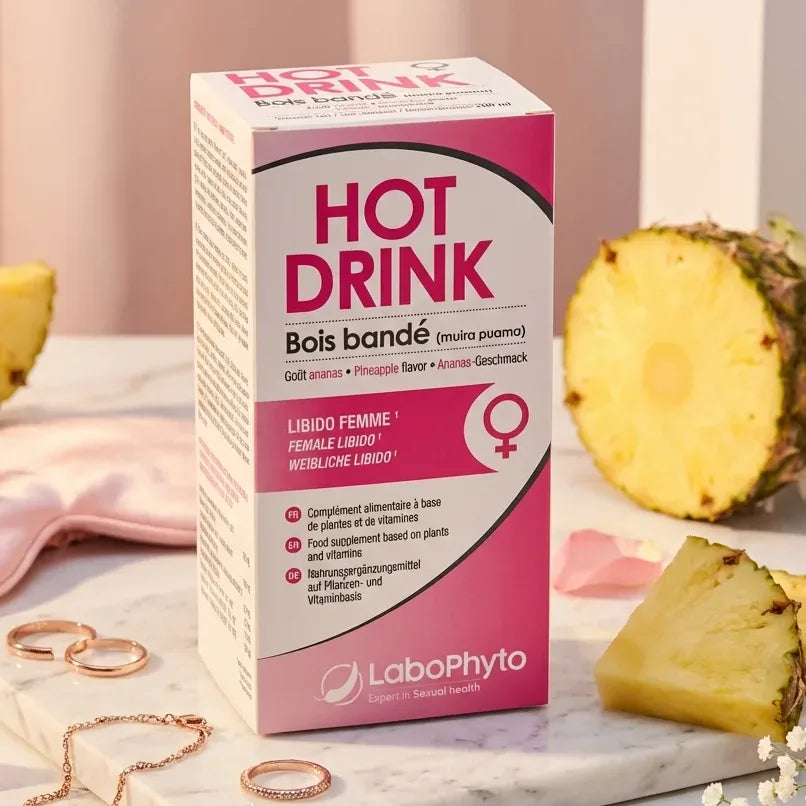 Hot Drink Femme Bois Bandé 250ml Labophyto présenté sur marbre avec ananas et éléments botaniques