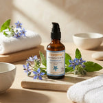 Flacon Huile de Bourrache Bio Florame 50ml avec fleurs de bourrache fraîches en ambiance spa