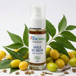 Huile de Neem Bio 30ml AyurVana avec feuilles et fruits frais de neem bio naturel