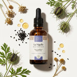Huile de nigelle bio 50ml Comptoir des huiles avec graines de nigelle et gouttes dorées