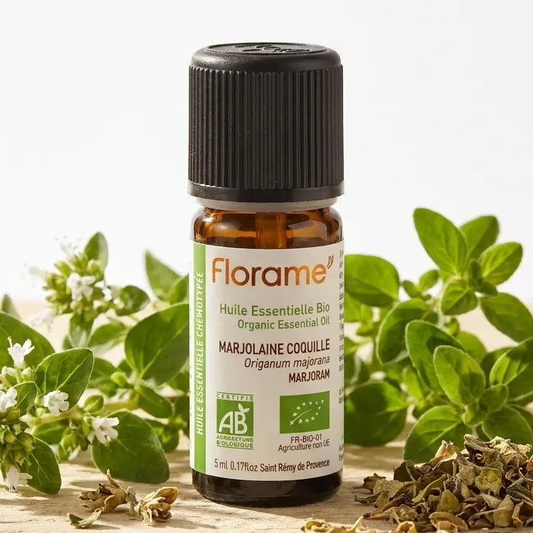 Huile essentielle marjolaine bio Florame 5ml flacon avec herbes fraîches et botaniques