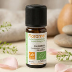 Huile essentielle Palmarosa Bio Florame 10ml en flacon ambré avec pétales de roses