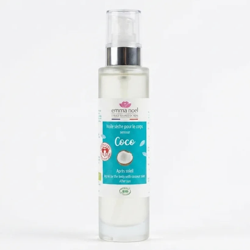 Huile sèche Emma Noël senteur coco 100ml avec pompe argent sur fond blanc