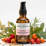 Huile végétale rose musquée bio 50ml Saint-Hilaire avec fruits et graines, flacon en verre ambré