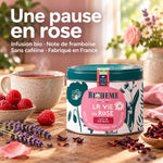 Infusion La Vie en Rose Biohême en boîte métal vrac, sur une table en bois avec framboises, hibiscus et lavande