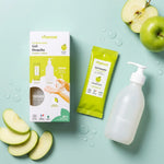 Kit découverte gel douche Pimpant pomme verte avec bouteille et recharge sur fond bleu pastel