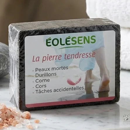 Pierre ponce Eolesens La Pierre Tendresse avec accessoires spa sur surface marbre luxe