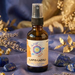 Huile de cristal Lapis-Lazuli Ansil 50ml avec cristaux et botaniques sur fond wellness doré