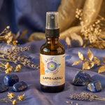 Huile de cristal Lapis-Lazuli Ansil 50ml avec cristaux et botaniques sur fond wellness doré