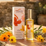 L'Été Fluide prolongateur bronzage bio Douces Angevines sur terrasse ensoleillée avec fleurs