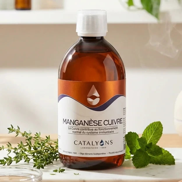 Catalyons Manganèse-Cuivre 500ml en flacon ambré sur un plan de travail wellness