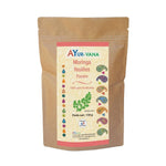 Moringa poudre Ayur-vana 150g sachet kraft avec étiquette crème et corail fond blanc