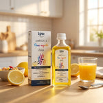 Bouteille Lysi Oméga 3 huile poisson 240ml sur plan de travail cuisine avec citron et verre jus