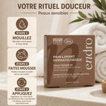 Pain lavant dermatologique Endro amande 85ml avec guide d'utilisation en 3 étapes sur fond beige