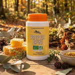 Propolis Brune bio 120 gélules Abeille Forestière sur surface bois avec miel et herbes
