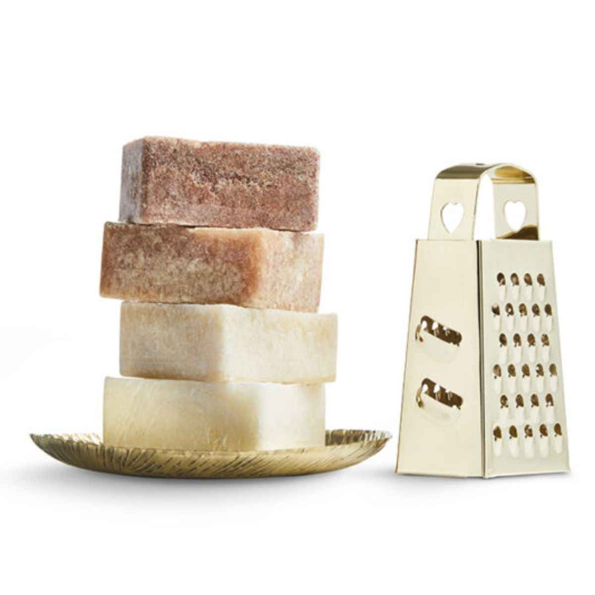 Une râpe dorée avec des carrés d'ambre de la marque Bybazz