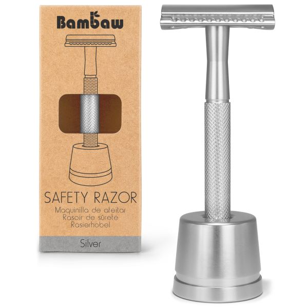 Un rasoir de sureté en métal argenté avec socle de la marque bambaw