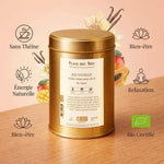 Rooibos Île Vanille Bio 100g - Boîte dorée avec icônes bien-être sur fond bois