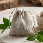 Sachet à thé voile de lin bio Angie Be Green avec cordon coton sur surface bois