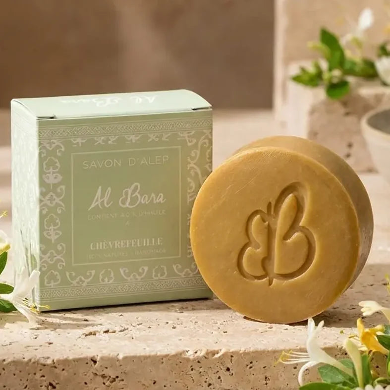 Savon d'Alep Al Bara Chèvrefeuille avec emballage vert menthe et fleurs de chèvrefeuille