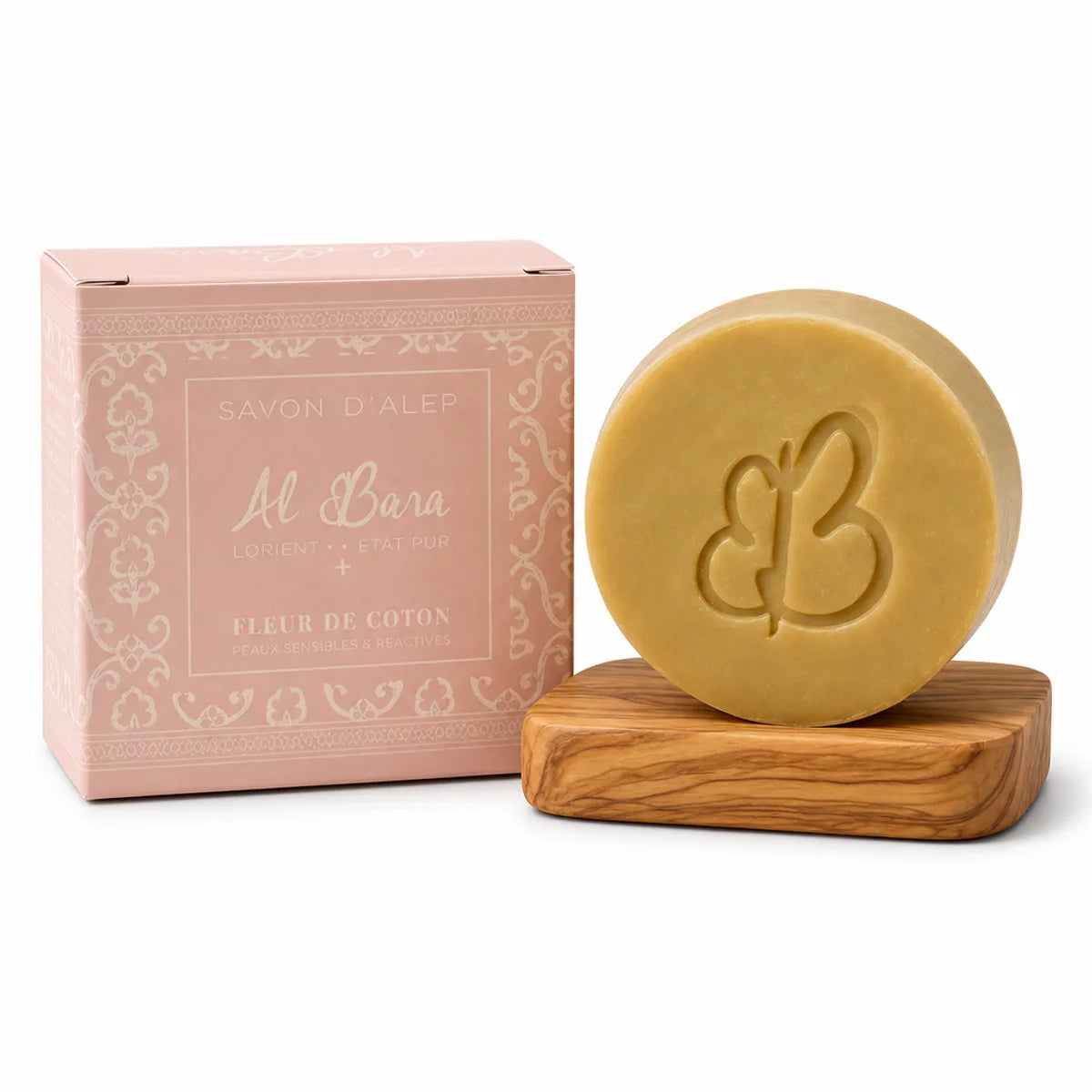 Savon d'Alep parfumé Fleur de coton Al Bara, pain rond doré sur soucoupe bois