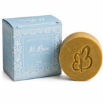 Savon d'Alep Iris Al Bara artisanal doré avec sa boîte bleue décorée, photo produit professionnelle