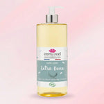 Un savon liquide de 1L de la marque Emma Noel hypoallergénique sur fond rose.