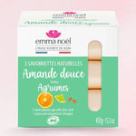 Des savonnettes senteur agrumes  de la marque Emma Noël sur fond rose. 