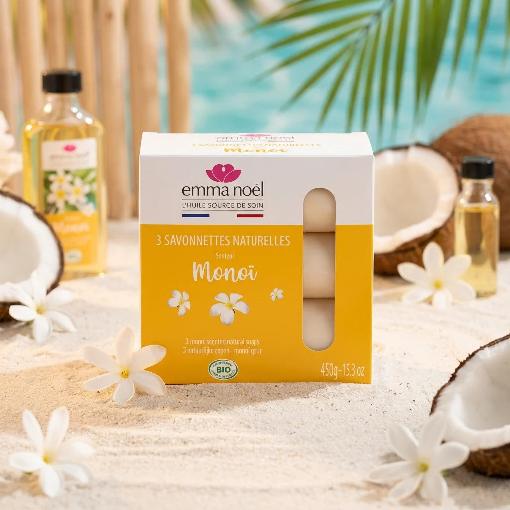 Savonnettes Monoï Bio Emma Noël 3x150g en packaging jaune avec fleurs tiare sur fond tropical