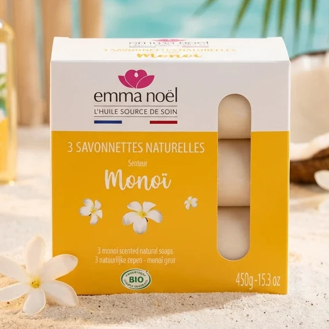 Savonnettes Monoï Bio Emma Noël 3x150g en packaging jaune avec fleurs tiare sur fond tropical