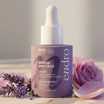 Sérum anti-âge collagène Endro 30mL sur marbre avec fleurs et pétales de rose