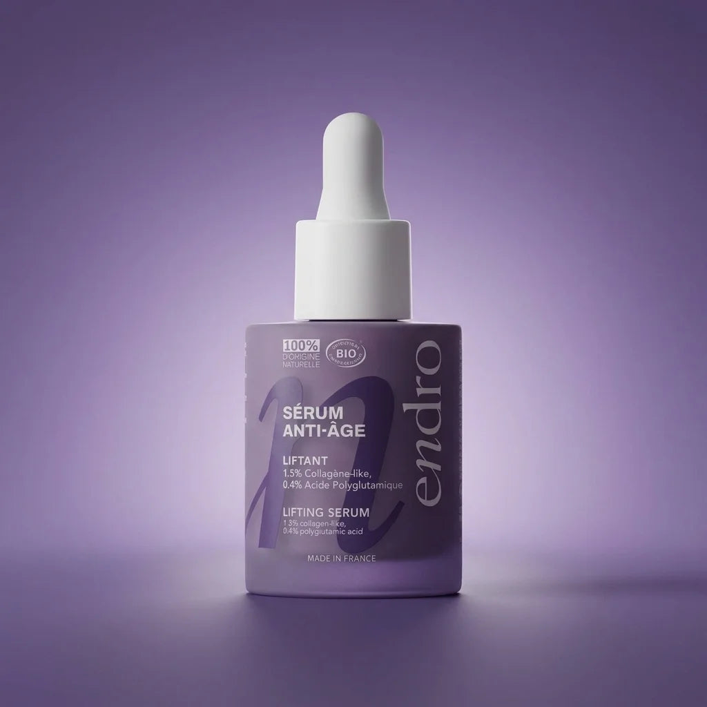 Sérum Anti-Âge Collagène Liftant Endro 30mL avec pipette sur fond dégradé violet