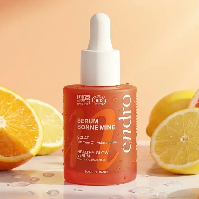 Sérum Bonne Mine Endro 10% Vitamine C en flacon verre avec agrumes et gouttes d'eau