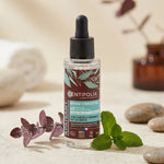 Sérum Concentré Apaisant Bio Centifolia 30ml avec compte-gouttes sur décor spa zen