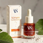 Sérum Luminescence Ultimate Bio 15ml Arc en Sels sur vanité marbre avec éléments botaniques
