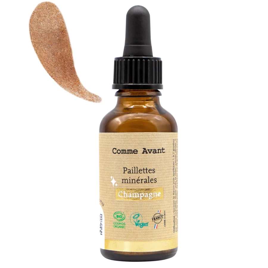 Une Huile pailletée corps & visage, teinte Champagne, de 30ml, de la marque Comme Avant