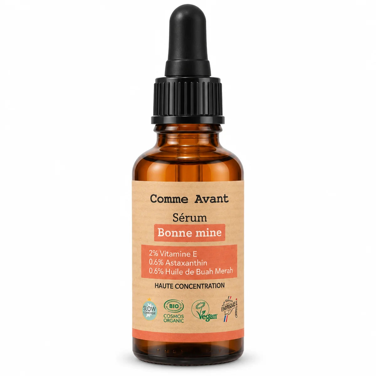 Flacon en verre ambré avec pipette noire et étiquette "Comme Avant" : sérum visage bonne mine 30 ml à la vitamine E et astaxanthine