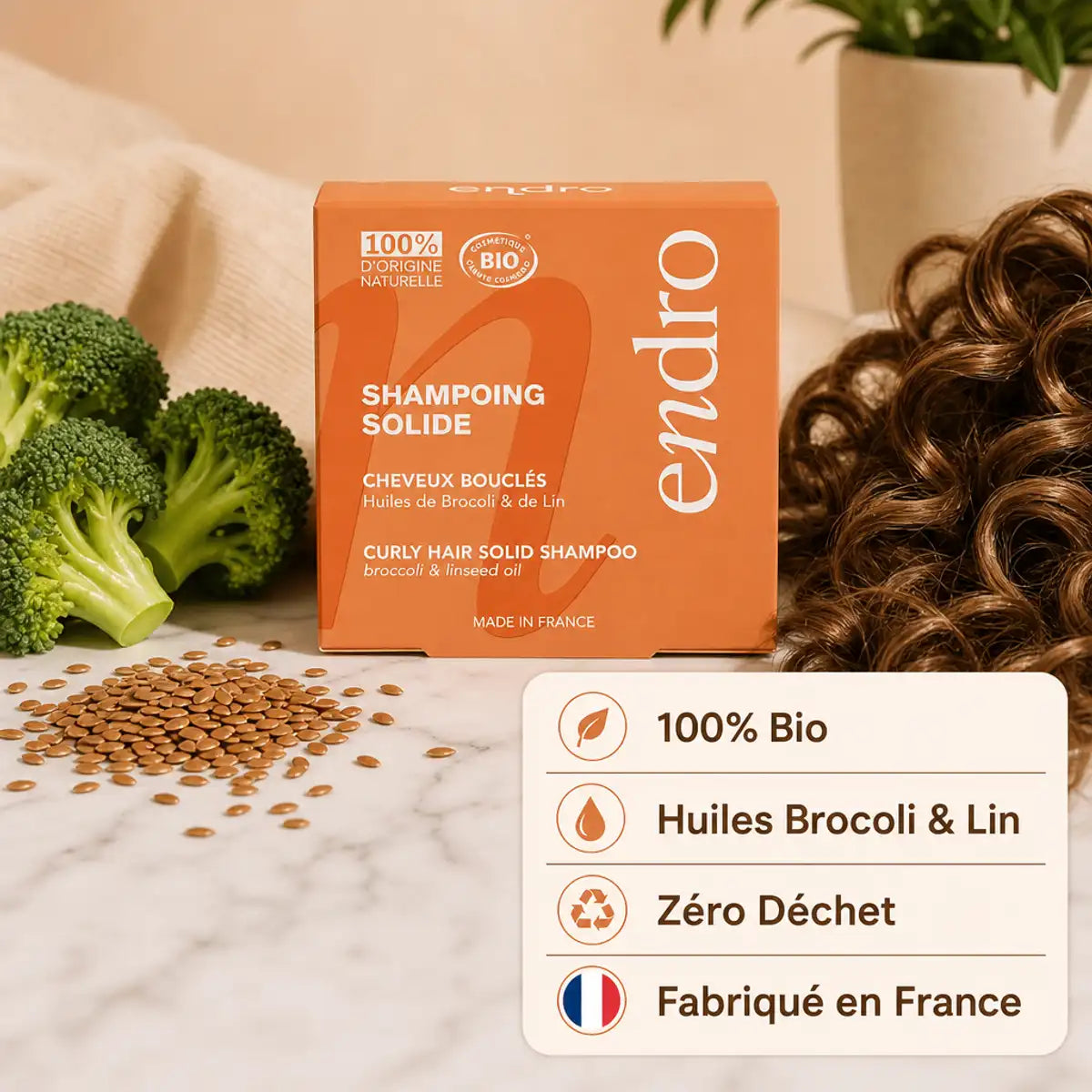 Shampoing solide Endro Huile Brocoli Lin cheveux bouclés packaging orange avec ingrédients naturels