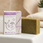 Shampoing solide nourrissant Antheya 100g avec emballage violet sur fond blanc
