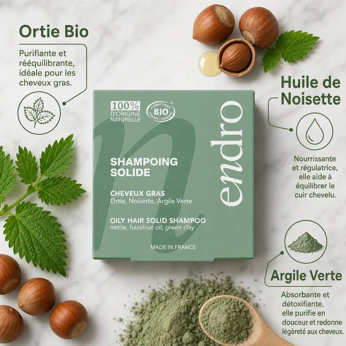 Shampoing solide Ortie Huile de Noisette Endro avec ingrédients naturels sur marbre blanc