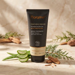 Shampooing douche Florame gel aloé vera bio 200ml sur marbre avec feuilles aloé et branches cèdre