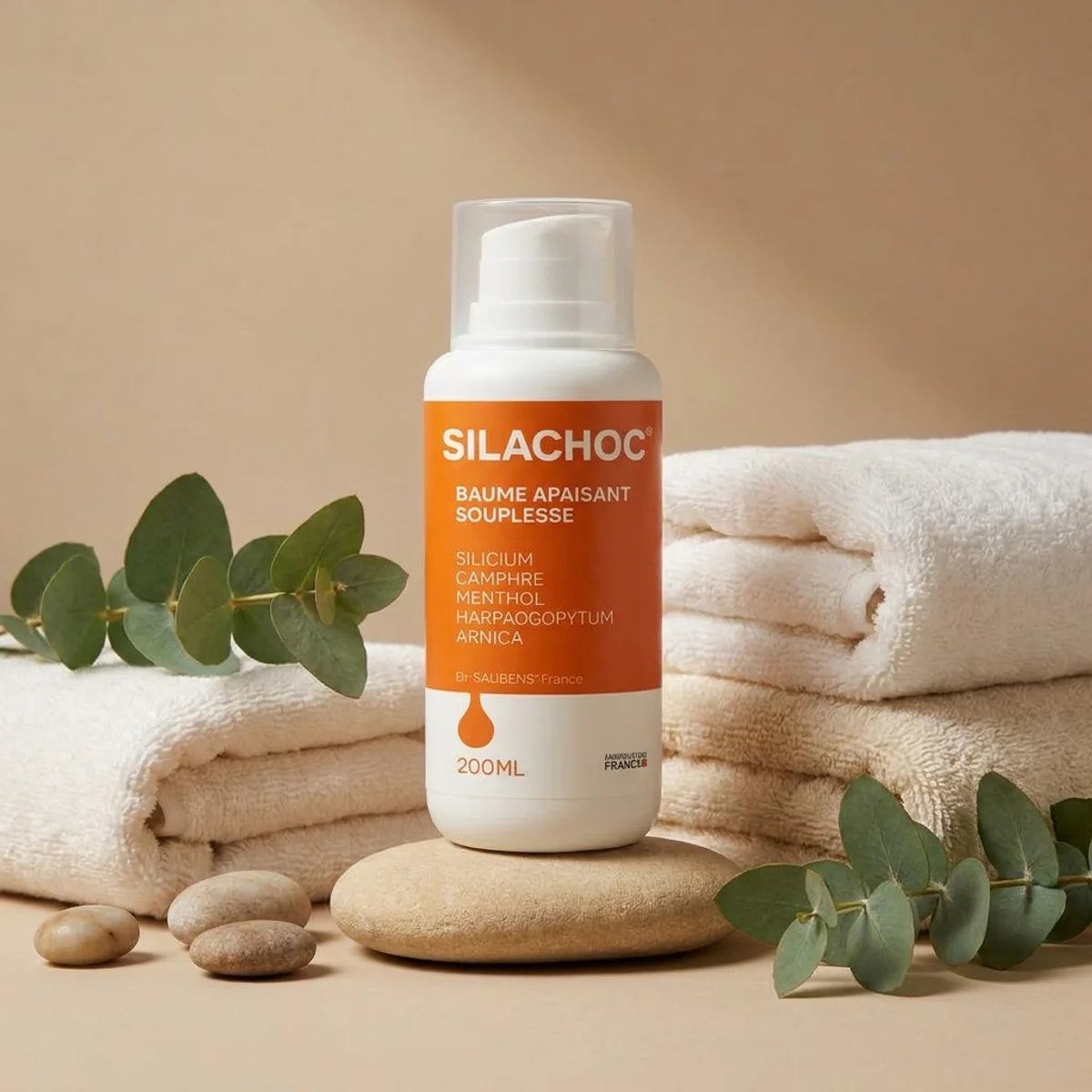 Silachoc 200 ml gel apaisant articulaire orange et blanc en ambiance bien-être spa avec pierre et eucalyptus