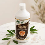 Bouteille Silicium Organique Olivital+ Active 1L sur marbre blanc avec feuilles vertes et gouttes d'eau