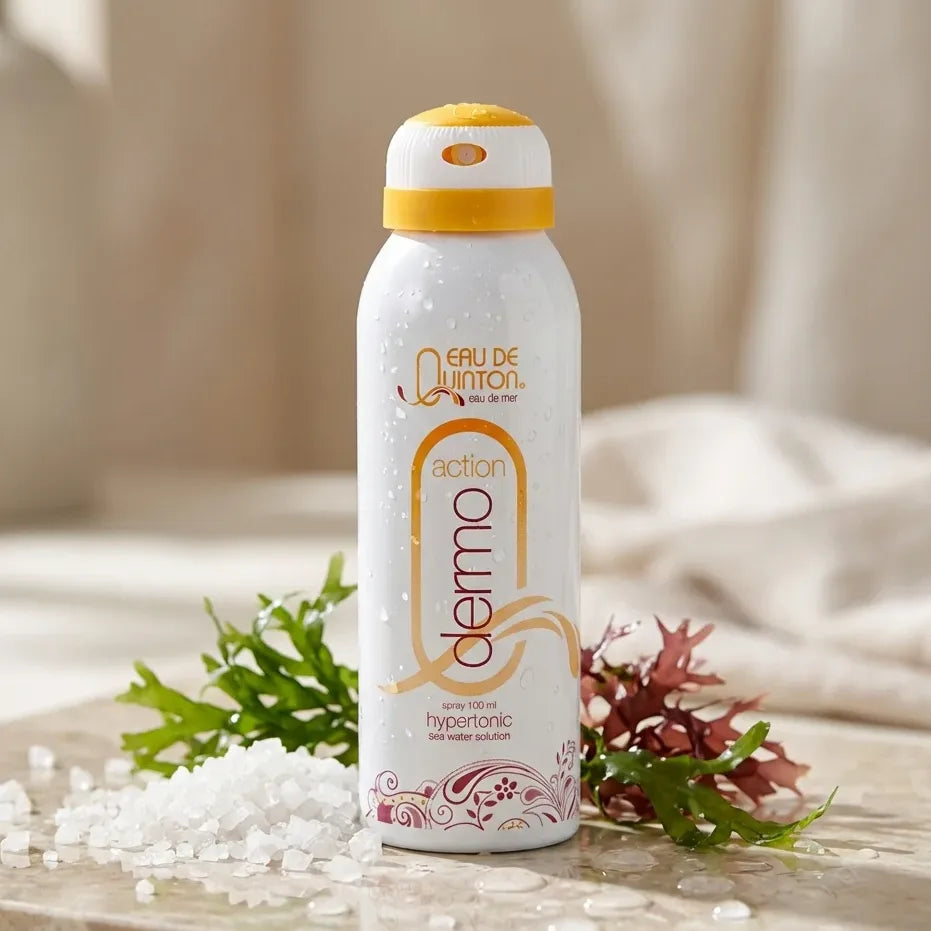 Spray Dermo Action Quinton 100ml hydratant apaisant revitalisant en packaging blanc or dans décor spa luxe