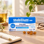 Stabilium 200 Yalacta avec capsules dorées sur bureau zen pour réduire fatigue et stress naturellement